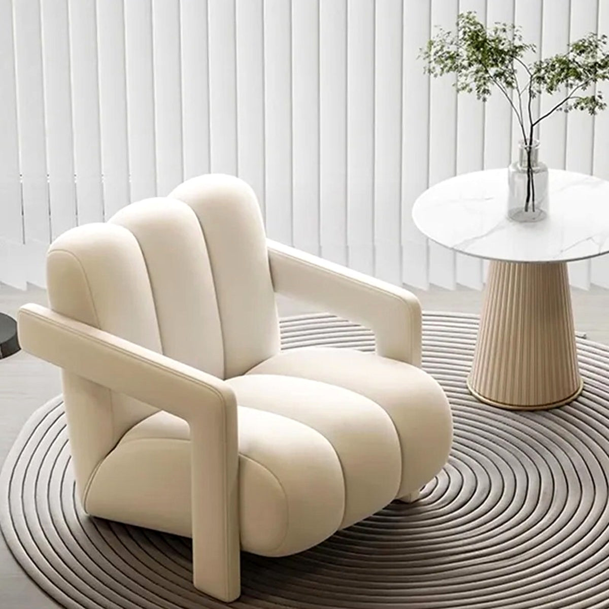 Fauteuil lounge à boudins en velours écru