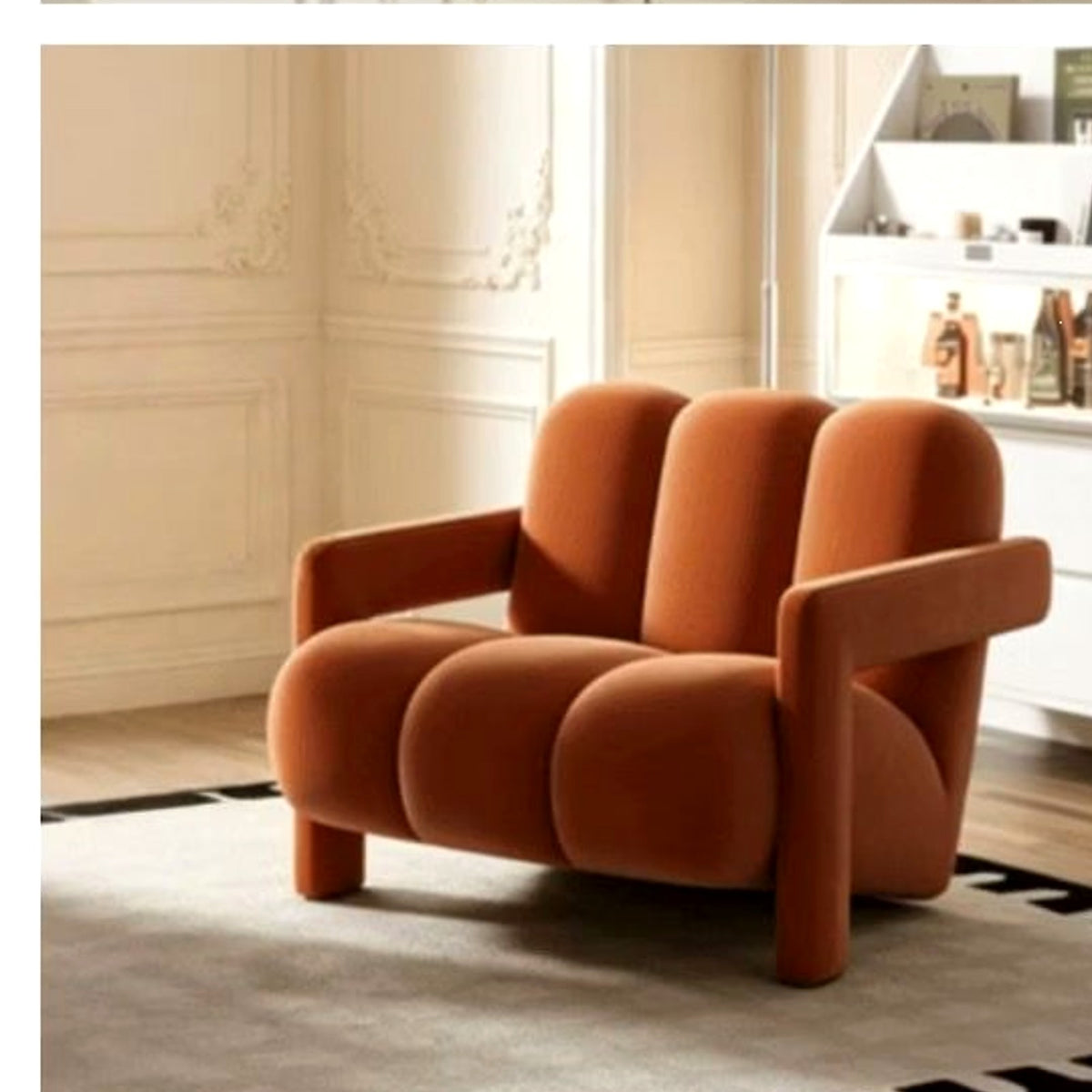 Fauteuil lounge à boudins en velours orange brûlé