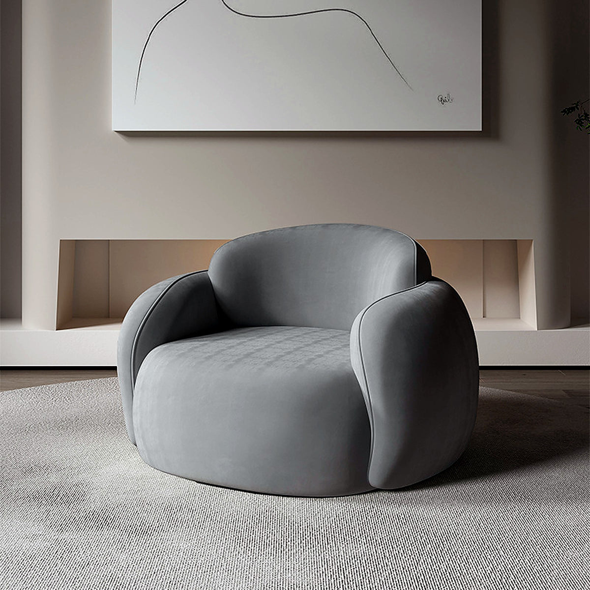 Fauteuil cocon arrondi en velours gris élégant